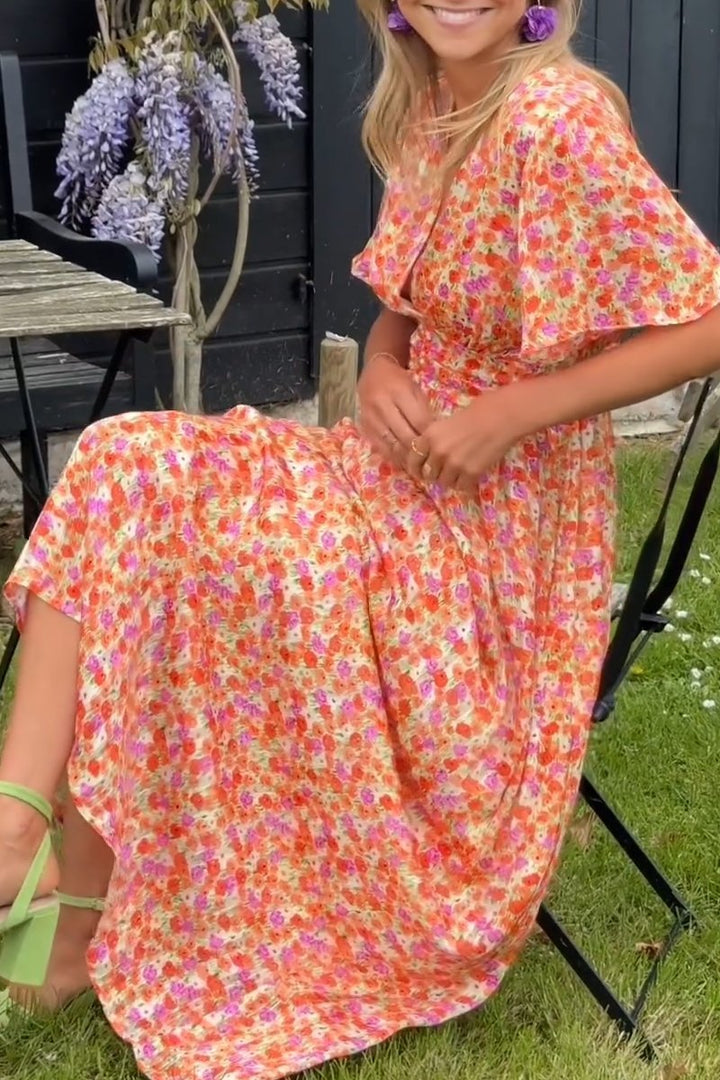Faith – elegantiška ilga suknelė su gėlėmis
